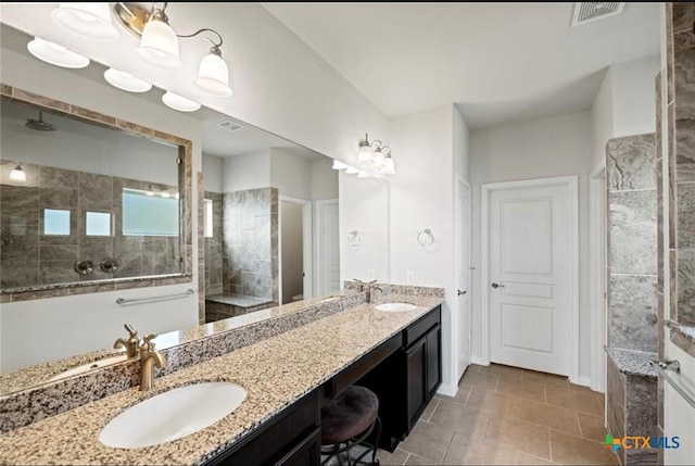 30125 Prairie Creek Ct, Brookshire, TX 77423 - bathroom with double vanity, walk in shower, and tile patterned flooring