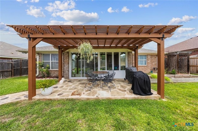 4105 Whispering Oaks, Temple, TX 76504 - back of house with brick siding, a fenced backyard, a pergola, and a patio area