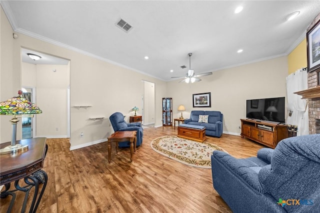 4105 Whispering Oaks, Temple, TX 76504 - living room featuring wood finished floors, recessed lighting, crown molding, and ceiling fan