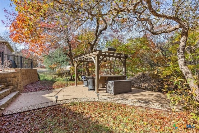 view of yard with an outdoor living space, a patio, and a pergola