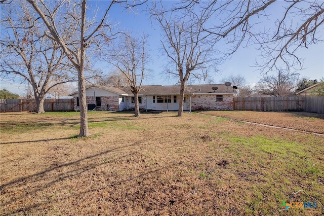 exterior space with a yard