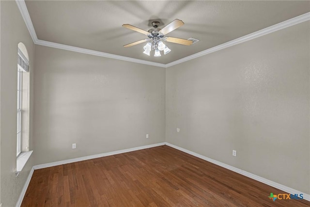 unfurnished room featuring ceiling fan, hardwood / wood-style floors, and ornamental molding