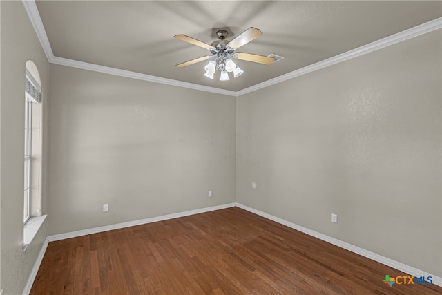 unfurnished room featuring hardwood / wood-style flooring, ceiling fan, and ornamental molding