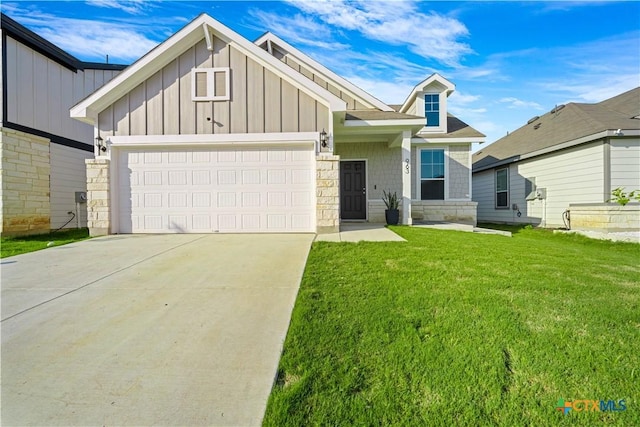 view of front of house with a garage and a front lawn