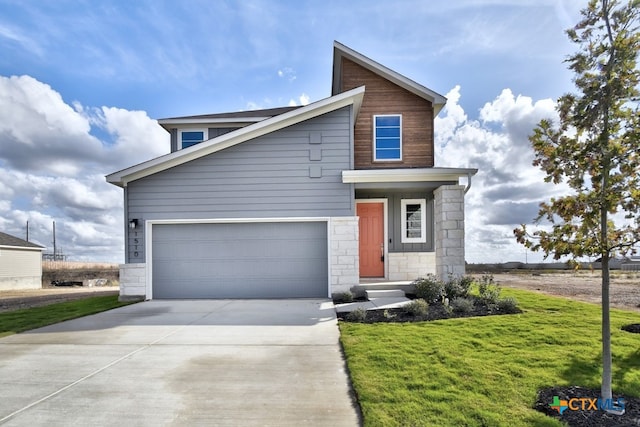 view of front facade with a front lawn and a garage