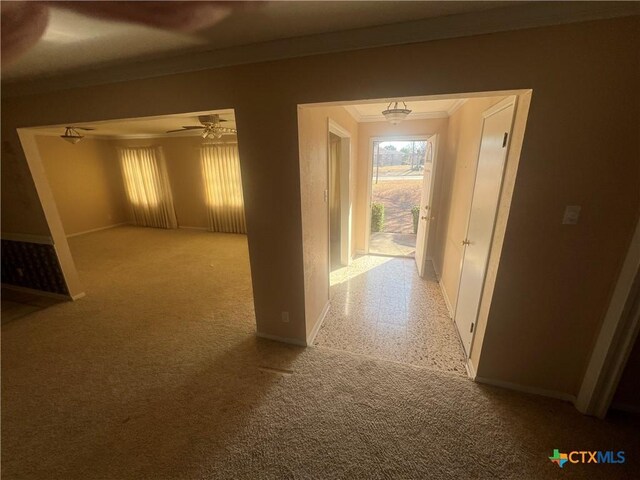 hallway featuring crown molding