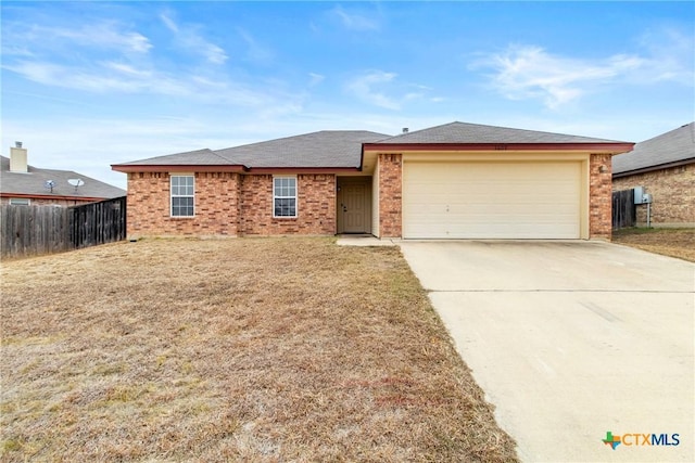 ranch-style home with a garage