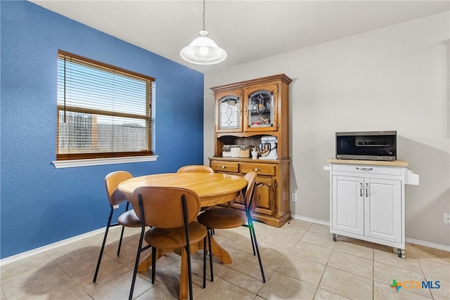 dining room featuring light tile patterned floors