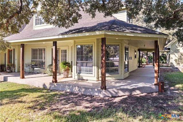 rear view of property with a patio