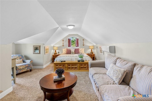 bedroom with light carpet and vaulted ceiling