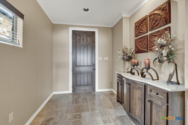 1746 Stagecoach Dr, Canyon Lake, TX 78133 - entrance foyer featuring stone tile floors and ornamental molding