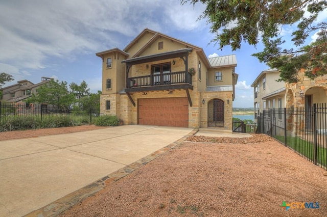 1746 Stagecoach Dr, Canyon Lake, TX 78133 - view of front of house with a balcony, an attached garage, stone siding, driveway, and stucco siding