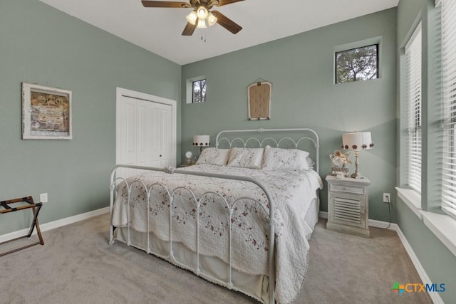 1746 Stagecoach Dr, Canyon Lake, TX 78133 - carpeted bedroom featuring a closet, multiple windows, and ceiling fan