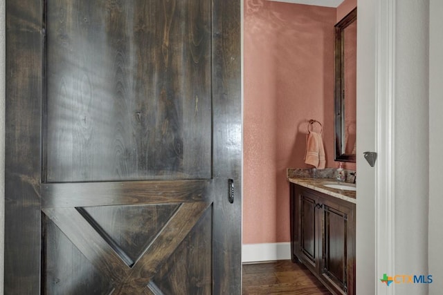 1746 Stagecoach Dr, Canyon Lake, TX 78133 - bathroom with vanity and wood finished floors