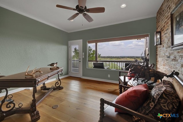 1746 Stagecoach Dr, Canyon Lake, TX 78133 - sitting room with hardwood / wood-style floors, crown molding, and ceiling fan