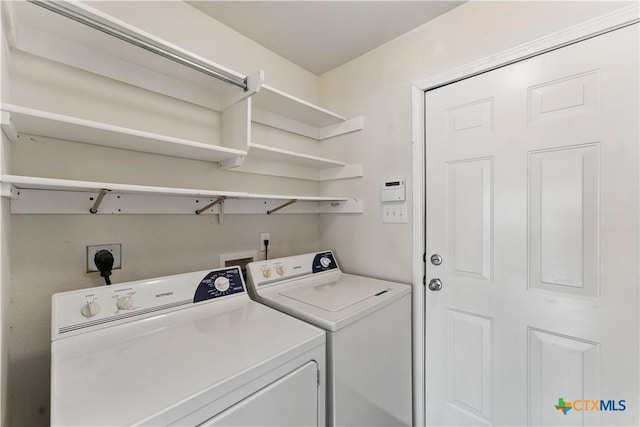 1711 Kelly Ct, New Braunfels, TX 78130 - laundry area with washer and clothes dryer