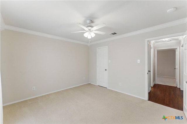 1711 Kelly Ct, New Braunfels, TX 78130 - unfurnished bedroom with crown molding, carpet flooring, and ceiling fan