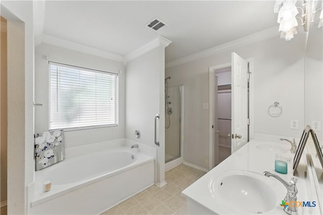 1711 Kelly Ct, New Braunfels, TX 78130 - bathroom featuring a garden tub, a stall shower, crown molding, double vanity, and a chandelier
