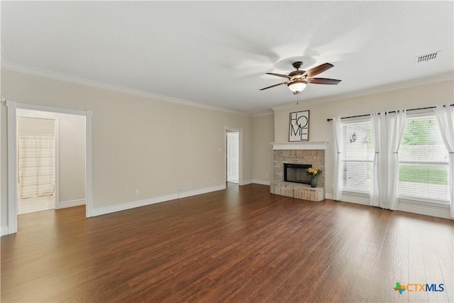 1711 Kelly Ct, New Braunfels, TX 78130 - unfurnished living room featuring ceiling fan, dark wood finished floors, crown molding, and a brick fireplace