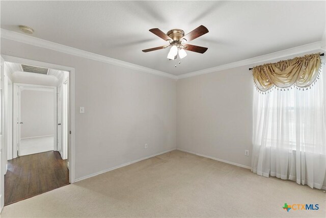 1711 Kelly Ct, New Braunfels, TX 78130 - carpeted spare room featuring ornamental molding, ceiling fan, and a smoke detector