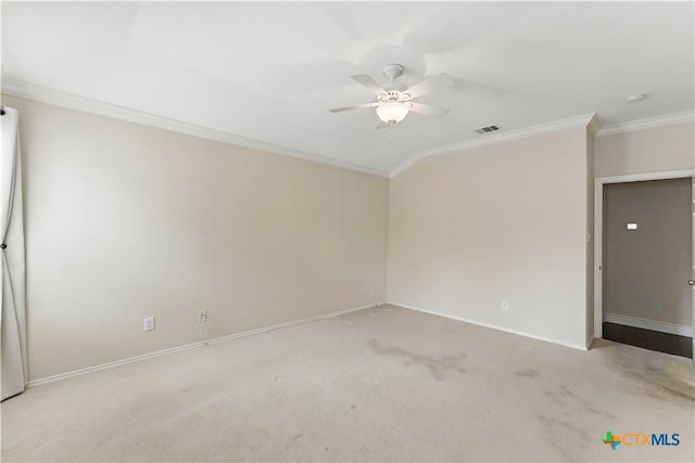1711 Kelly Ct, New Braunfels, TX 78130 - carpeted spare room featuring ornamental molding and a ceiling fan