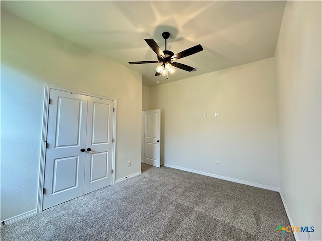 505 Magnolia Dr, Troy, TX 76571 - unfurnished bedroom featuring carpet floors, baseboards, ceiling fan, and a closet