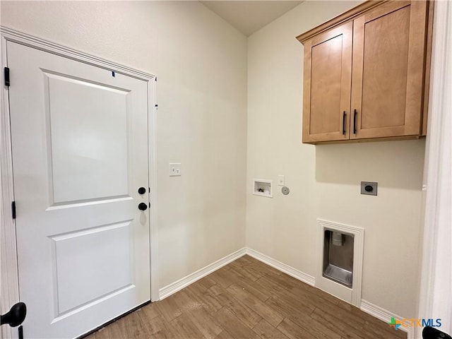 505 Magnolia Dr, Troy, TX 76571 - washroom with hookup for an electric dryer, cabinet space, baseboards, wood finished floors, and hookup for a washing machine