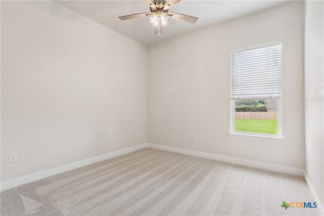 1702 Kellan Dr, Salado, TX 76571 - empty room featuring light carpet, baseboards, and ceiling fan