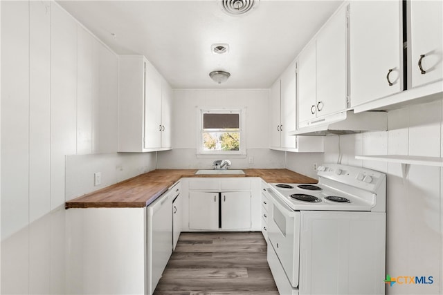 kitchen featuring white cabinets, white appliances, sink, and dark wood-type flooring