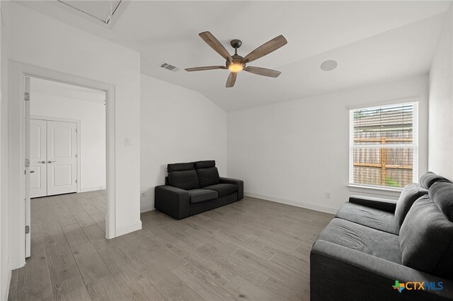 21203 Santa Rosa Ave, Lago Vista, TX 78645 - living room featuring light wood-style flooring, ceiling fan, and lofted ceiling