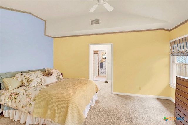 carpeted bedroom with lofted ceiling and ceiling fan