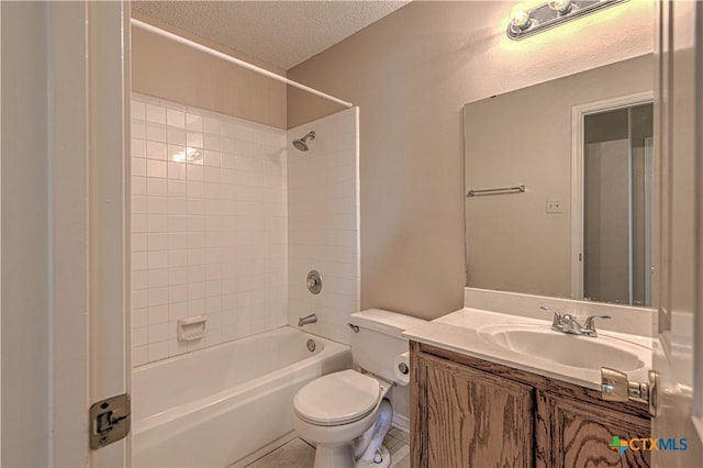 607 Moccasin Dr, Harker Heights, TX 76548 - full bath with shower / washtub combination, a textured ceiling, vanity, and tile patterned flooring
