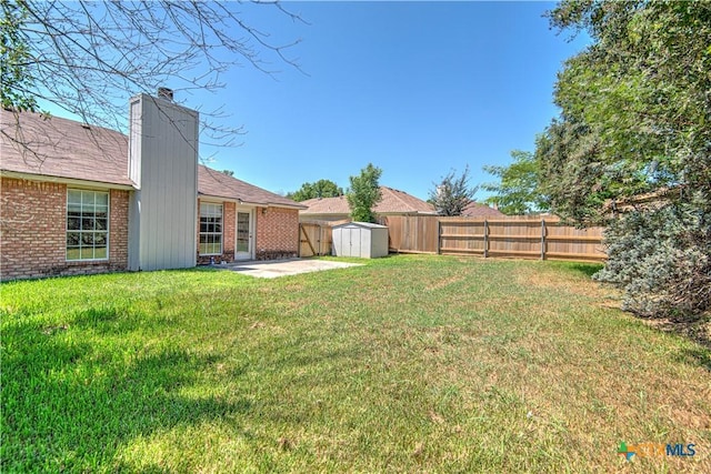 607 Moccasin Dr, Harker Heights, TX 76548 - fenced backyard featuring a storage unit and a patio