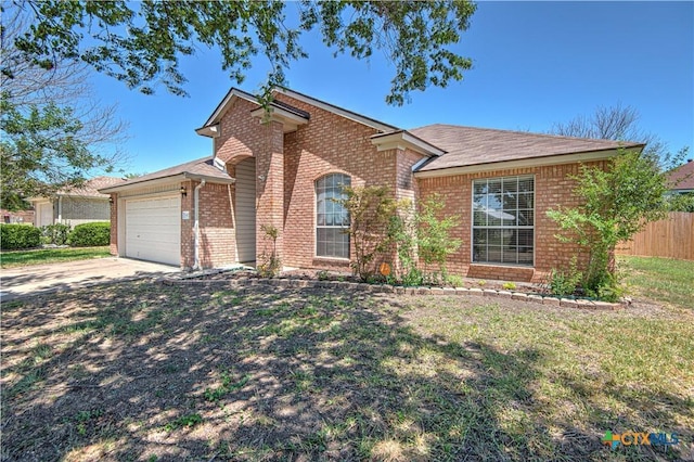 607 Moccasin Dr, Harker Heights, TX 76548 - view of front of house with brick siding, a garage, and concrete driveway