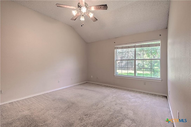 607 Moccasin Dr, Harker Heights, TX 76548 - carpeted empty room with a textured ceiling, vaulted ceiling, and a ceiling fan