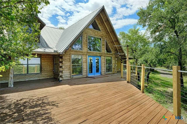 wooden deck featuring french doors