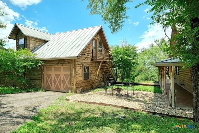 view of outdoor structure featuring a garage