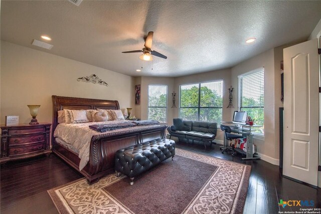 bedroom with a textured ceiling, baseboards, ceiling fan, wood finished floors, and recessed lighting