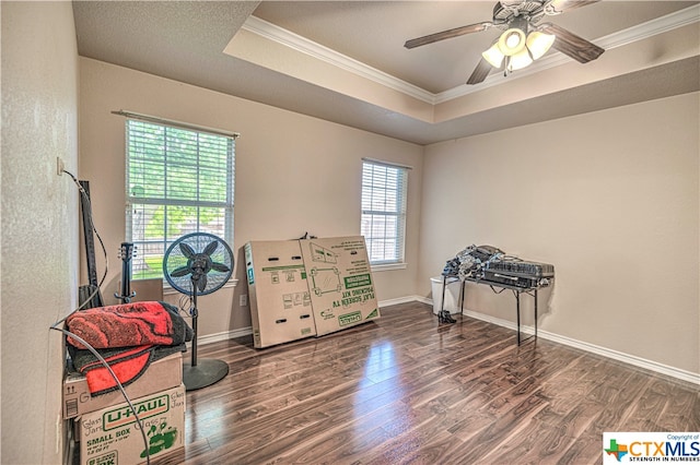 miscellaneous room featuring ceiling fan, wood-type flooring, and ornamental molding