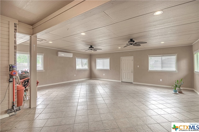 interior space with ceiling fan and a wall mounted AC