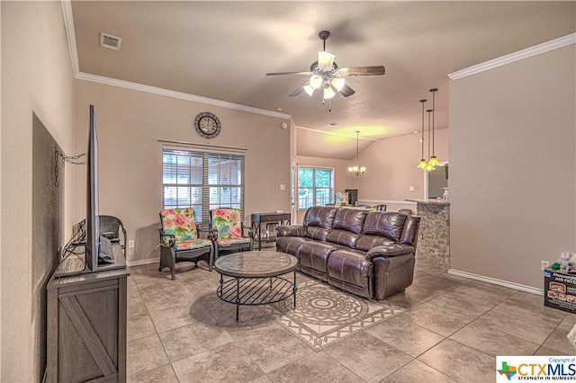 tiled living room featuring a textured ceiling, crown molding, and ceiling fan with notable chandelier