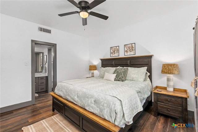 bedroom featuring baseboards, visible vents, a ceiling fan, connected bathroom, and dark wood-type flooring