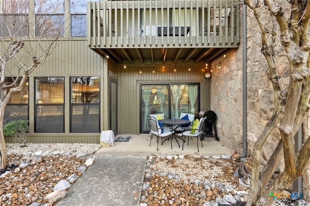 view of patio with a balcony