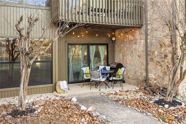 view of patio / terrace with a balcony