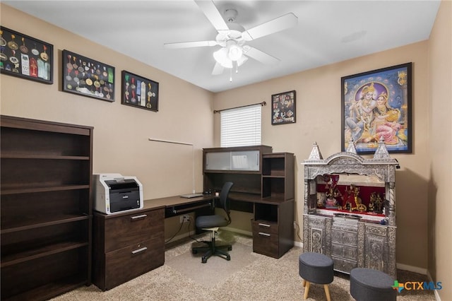 106 Sandstone Ct, Victoria, TX 77904 - home office with carpet floors, a ceiling fan, and baseboards