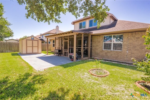 106 Sandstone Ct, Victoria, TX 77904 - back of property featuring a pergola, a patio, and brick siding