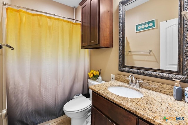 106 Sandstone Ct, Victoria, TX 77904 - full bathroom featuring vanity, toilet, a shower with curtain, and tile patterned flooring
