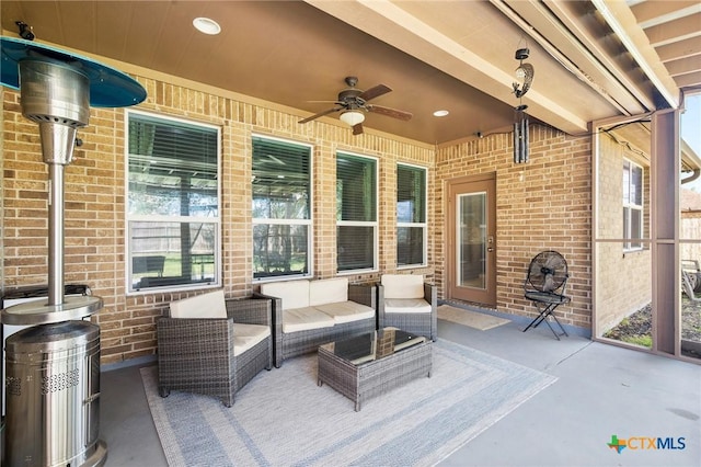 106 Sandstone Ct, Victoria, TX 77904 - view of patio with a ceiling fan and an outdoor hangout area