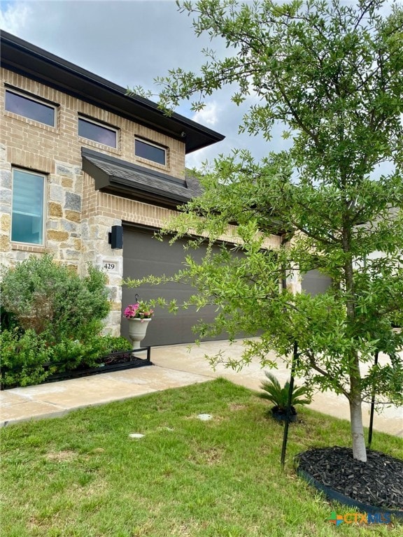 429 Juana Way, New Braunfels, TX 78132 - view of side of home featuring stone siding and a lawn