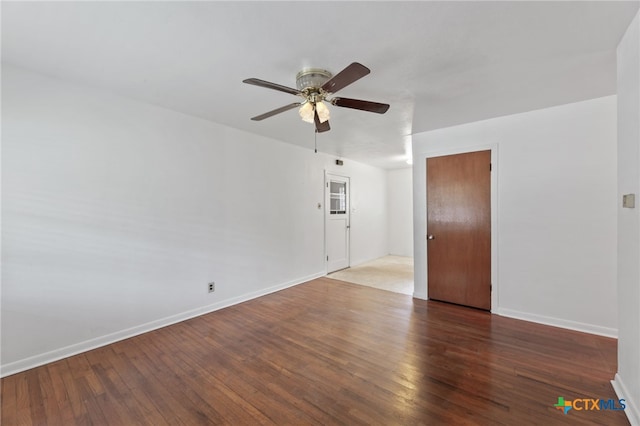 unfurnished room featuring ceiling fan and dark hardwood / wood-style flooring